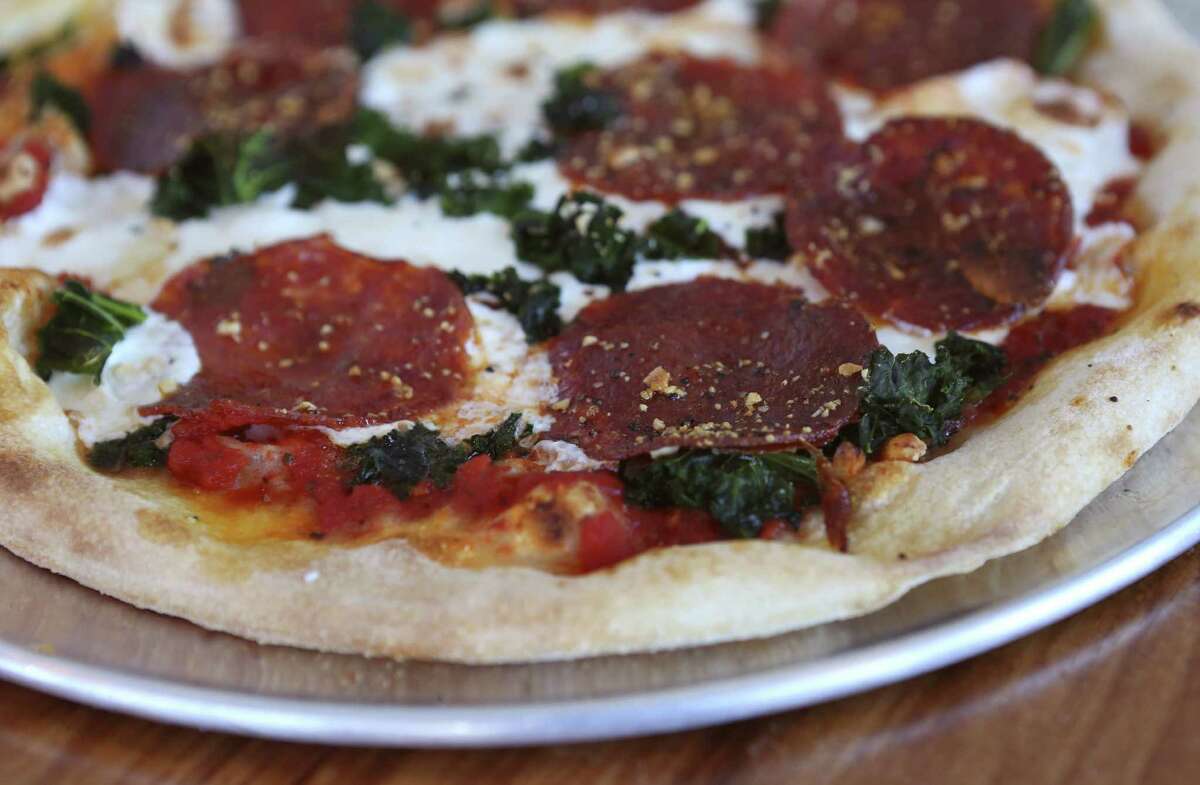 The SoBro Pepperoni pizza makes a classic dish a little more upscale with cured salami, bits of cashew and kale and mozzarella.