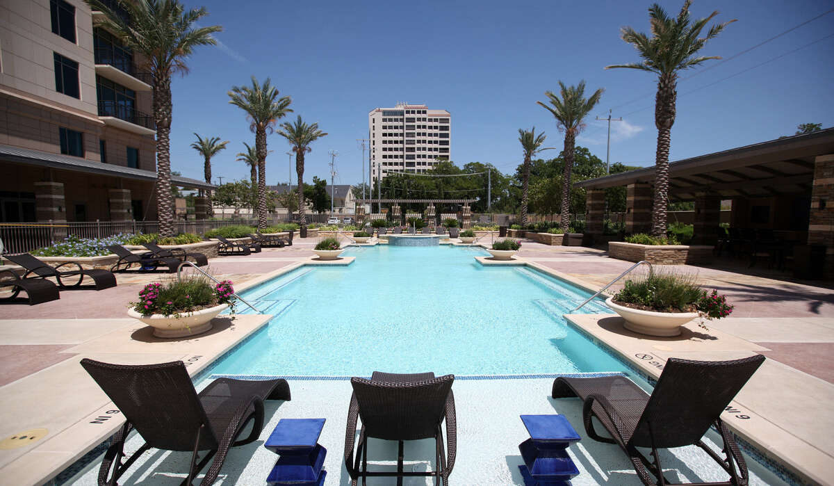 San Antonio's condo and townhouse sales grew by 18 percent the first five months of 2014. The pool at The Broadway luxury high-rise at 4242 Broadway Street beckons on a hot summer day, offering a cool alternative to mowing one's suburban house lawn or laying down driveway asphalt in the heat.