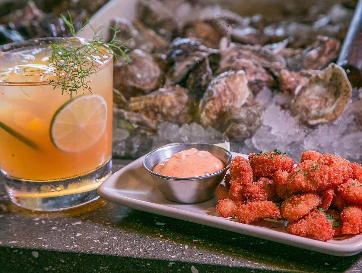 The fried Clam Strips and the "Marshall Mule" cocktail at Hog Island in San Francisco, Calif., are seen on Wednesday, July 2nd, 2014.