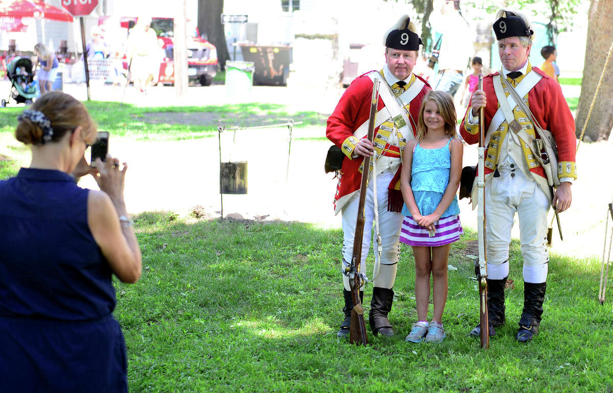 Family Fun Fest held on the Town Hall Green and the Fairfield Museum and History Center in Fairfield, Conn. on Saturday July 5, 2014. The festival featured a full slate of musical entertainment, artisan fair, and games and activities for children. Also, Revolutionary War British soldier re-enactors were encamped on the premises, wearing the traditional "red coat" uniforms as well as firing replica period musket rifles.