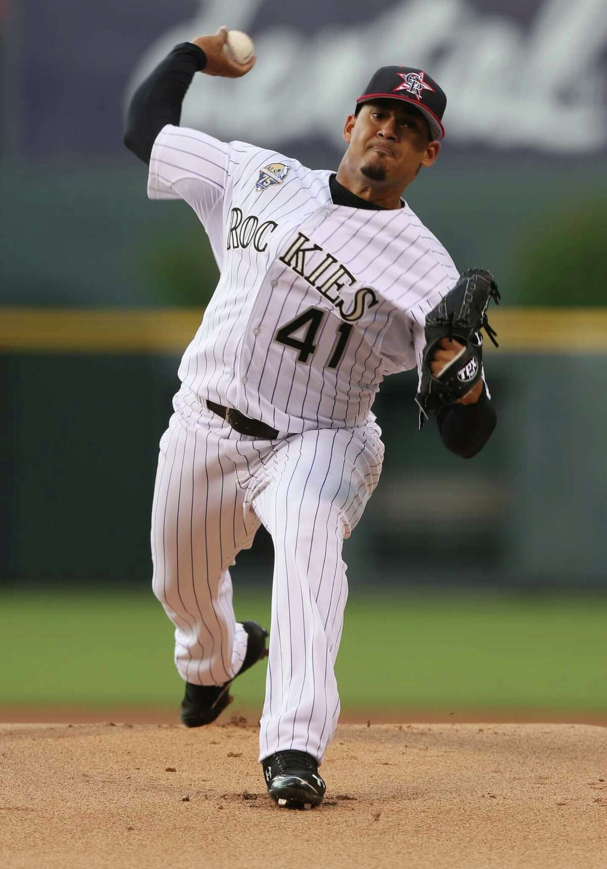 Making his season debut, Colorado Rockies starting pitcher Jair Jurrjens works against the Los Angeles Dodgers in the first inning of a baseball game in Denver, Friday, July 4, 2014. (AP Photo/David Zalubowski)