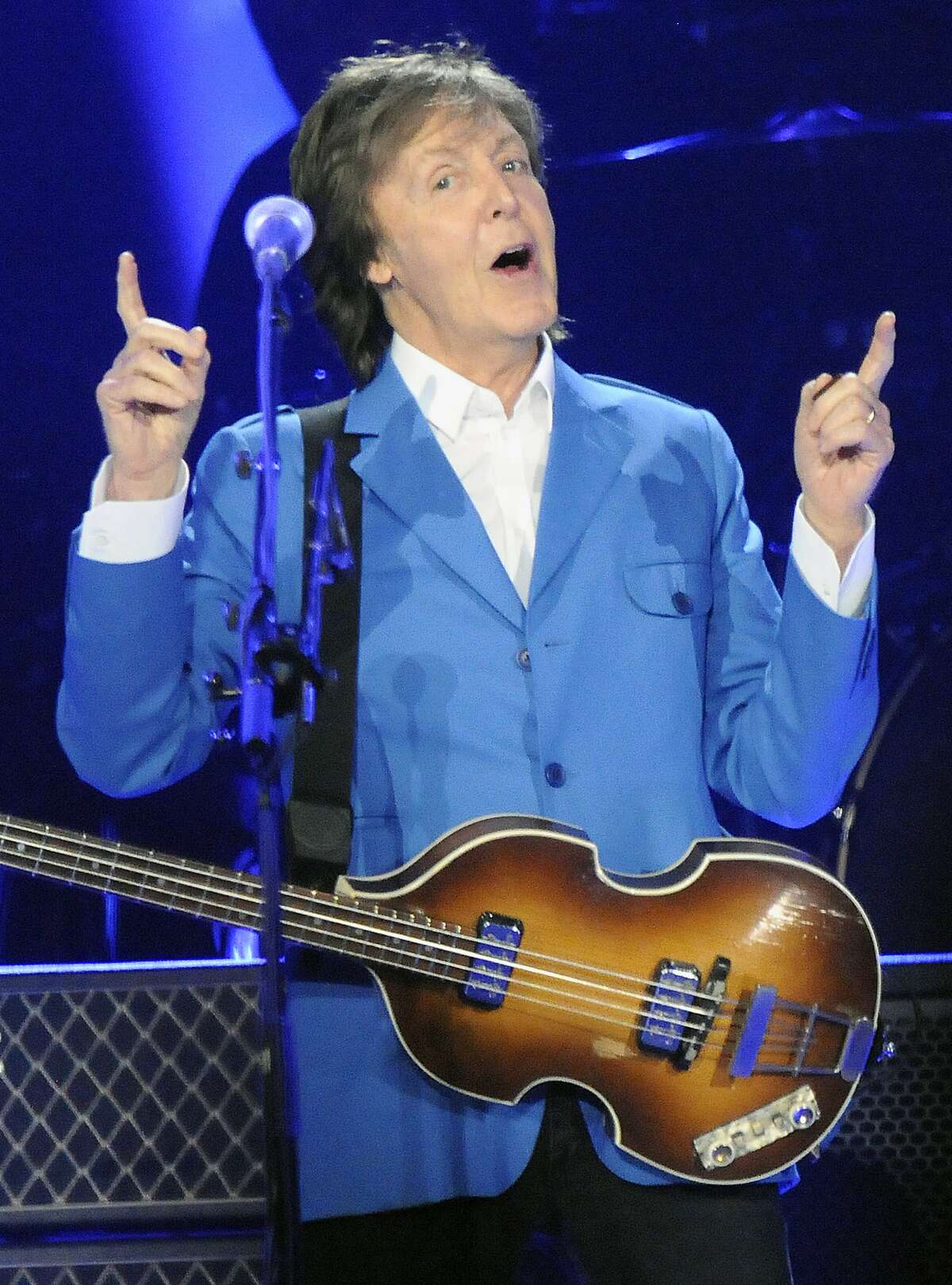 Sir Paul McCartney performs with his band during the “Out There" Tour at the Times Union Center on Saturday, July 5, 2014, in Albany, N.Y. (Photo by Hans Pennink/Invision/AP)