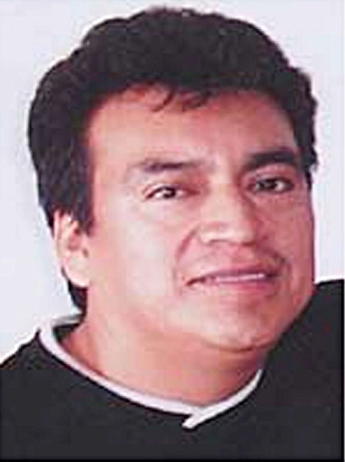 (PROVIDED PHOTO BY THE FBI) Gerardo "El Gallo" Salazar Federal police in Mexico say they arrested Gerardo Salazar who is on the FBI's most wanted list for allegedly trafficking women and minors for prostitution in Houston. Tuesday, March 2, 2010, in Houston.