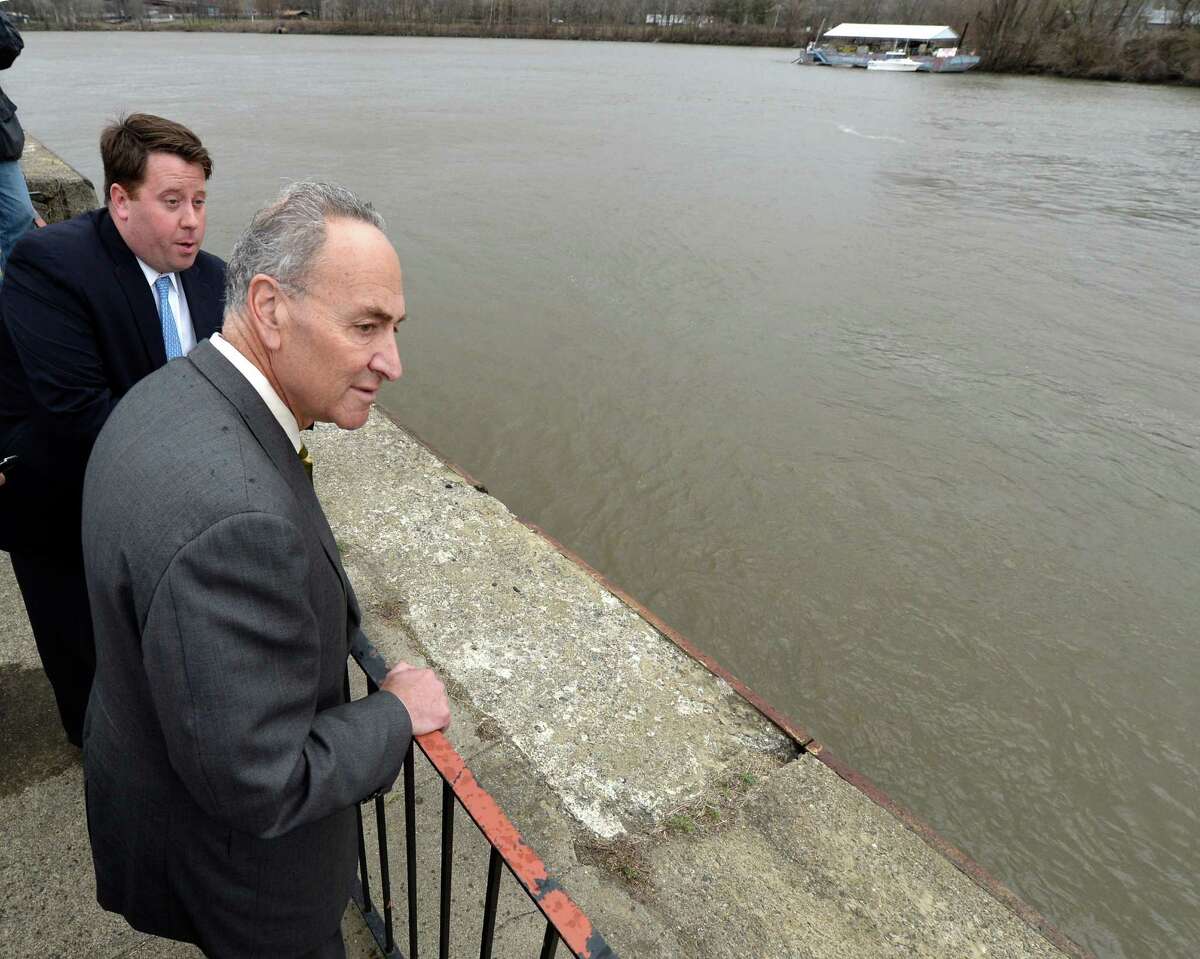 Senator Charles Schumer, center, looks over the deterioration of the the Troy seawall Tuesday morning, April 15, 2014, inTroy, N.Y. Schumer is joined by Tom Nardacci of Gramercy Communications and director of the Troy BID. (Skip Dickstein / Times Union archive)