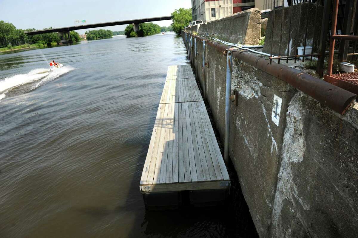 A jet skier cruises past the deteriorating seawall along the Hudson River on Wednesday, July 17, 2022, at the docks in Troy, N.Y. (Cindy Schultz / Times Union archive)