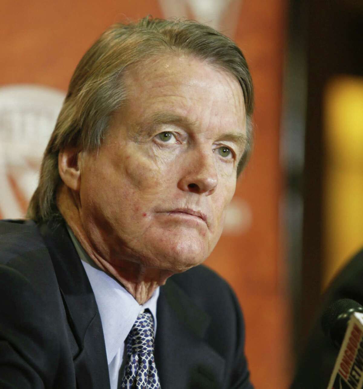 University of Texas president Bill Powers discusses the search for a new head football coach in Austin, Texas on Sunday, Dec. 15, 2013. Current coach Mack Brown announced he was stepping down from the position following the Valero Alamo Bowl on Dec. 30. (AP Photo/Jack Plunkett)