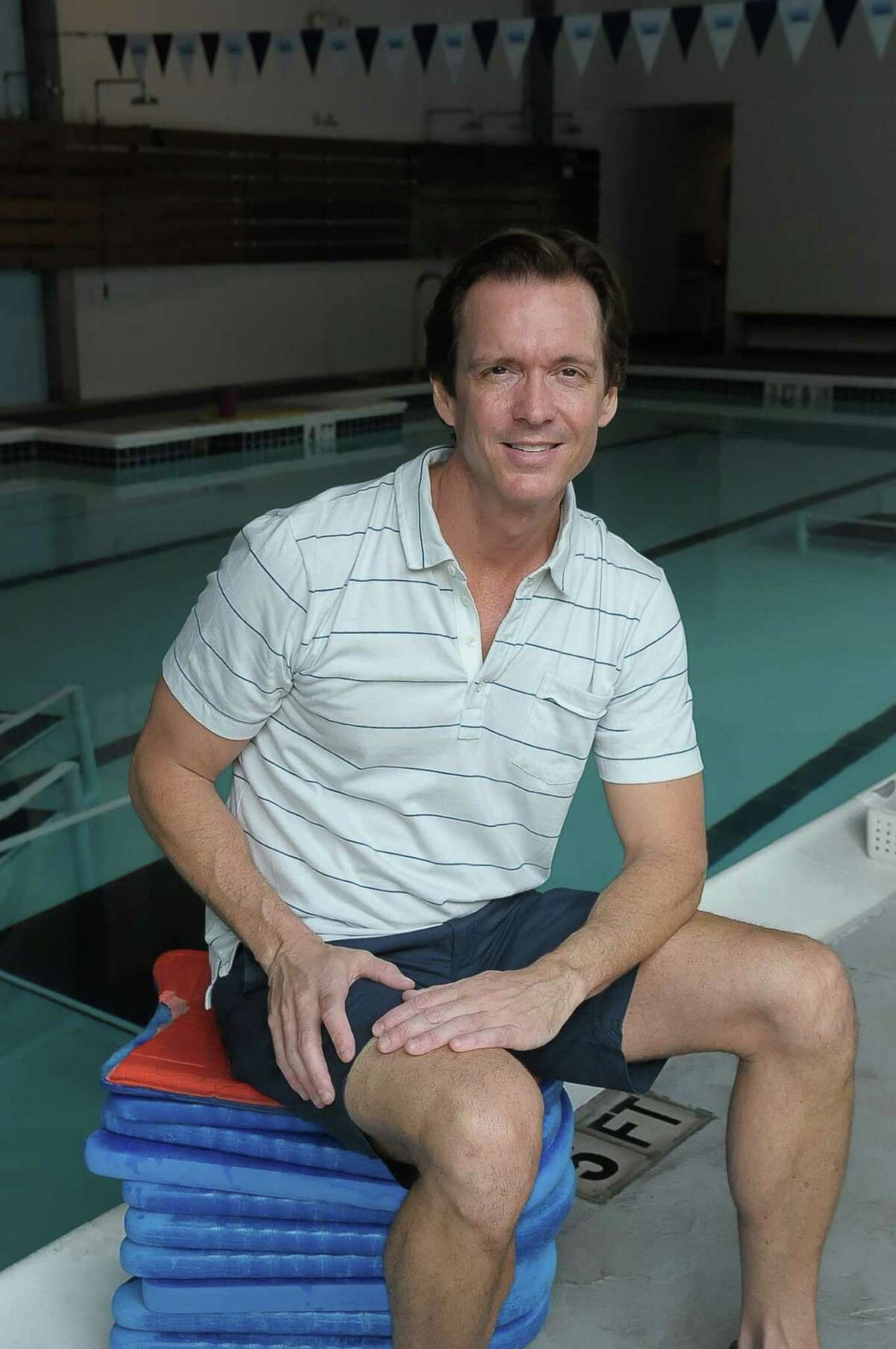 Chad Neal is celebrating the Saint Street Swim's 20th year in business.