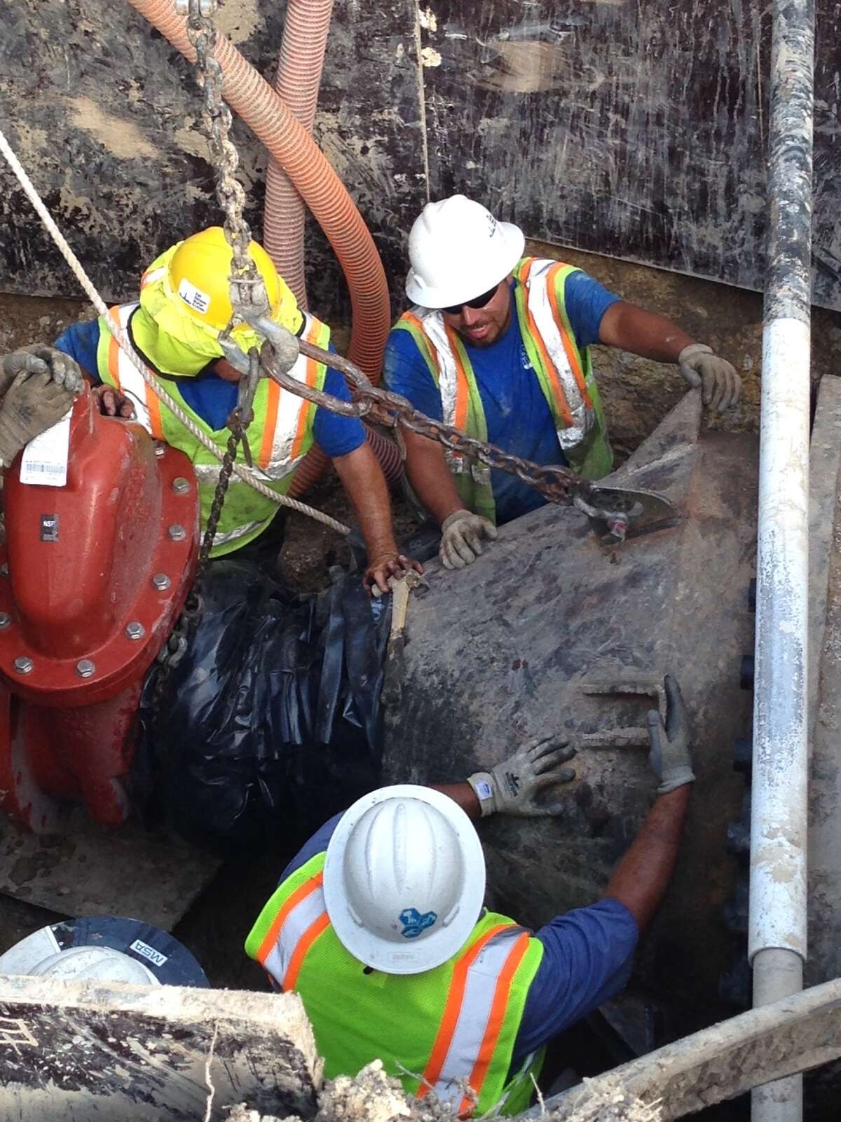 A San Antonio Water System crew works on repairs to a 48-inch mainline connection that ruptured last week, leading SAWS officials to ban outdoor water use in the Stone Oak area until Thursday morning. The rupture to a former Bexar Metropolitan Water District pipeline at U.S. 281 and Bitters Road caused water pressure to plummet, requiring officials to impose the outdoor water ban. Officials needed to ship parts from H ouston to complete the repairs.