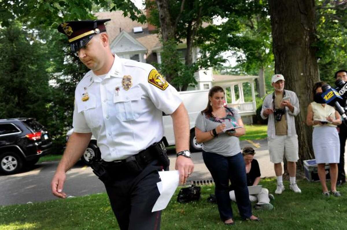 Ridgefield father charged in son's hot car death