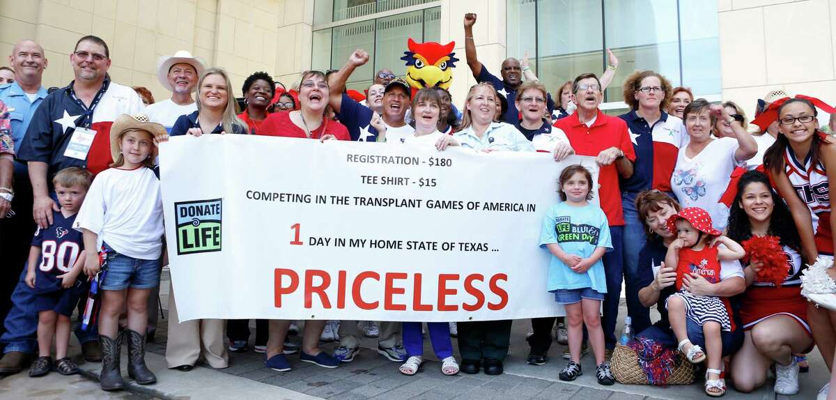 Team Texas and their supporters pose for a photo at a Pep Rally for the Transplant Games held at Texas Medical Center Commons, 6550 Bertner St., Wednesday, July 9, 2014, in Houston.