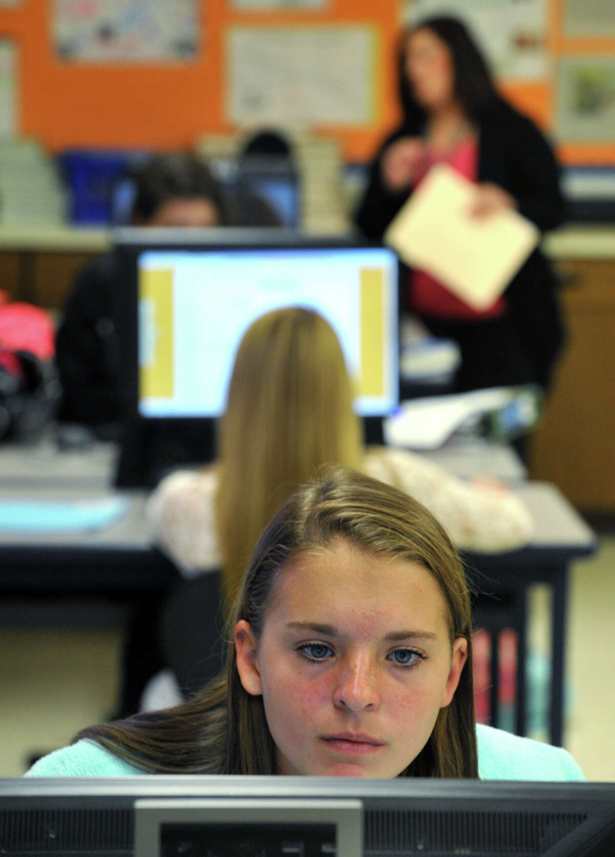 Katie Flournoy, 17, does research during a financial literacy class in Galloway Township, N.J.