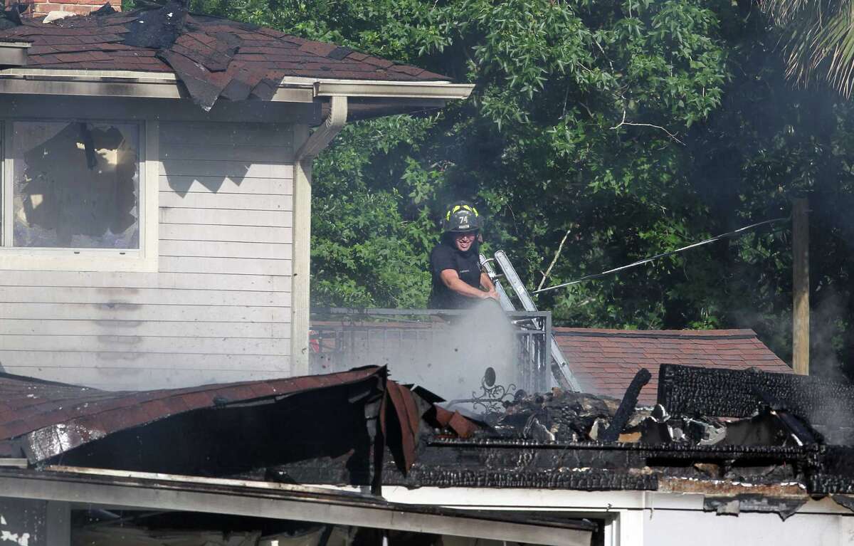 Firefighter dies in house blaze