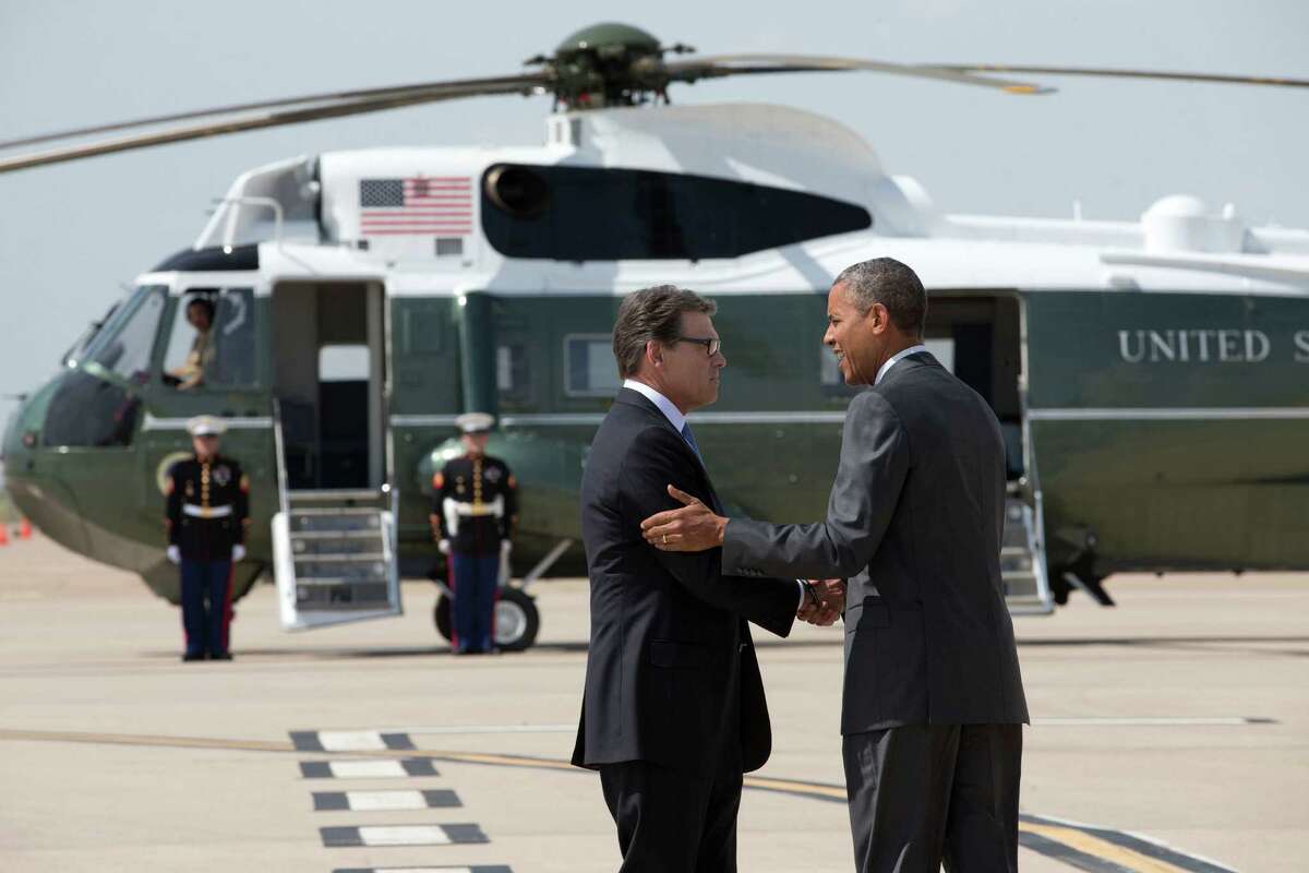 President Barack Obama got a warm greeting from Gov. Rick Perry as he arrived Wednesday at Dallas/Fort Worth International Airport.