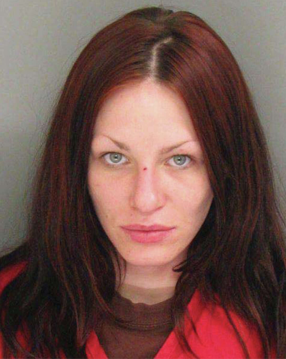 This image provided by the Santa Cruz Police Department shows Alix Catherine Tichleman after she was booked into county jail in Santa Cruz, Calif., on Friday, July 4, 2014. Tichleman was arrested on suspicion of murder after injecting heroin into a Google executive on his yacht in Santa Cruz and leaving him to die when he overdosed, according to police and a newspaper. (AP Photo/Santa Cruz Police)