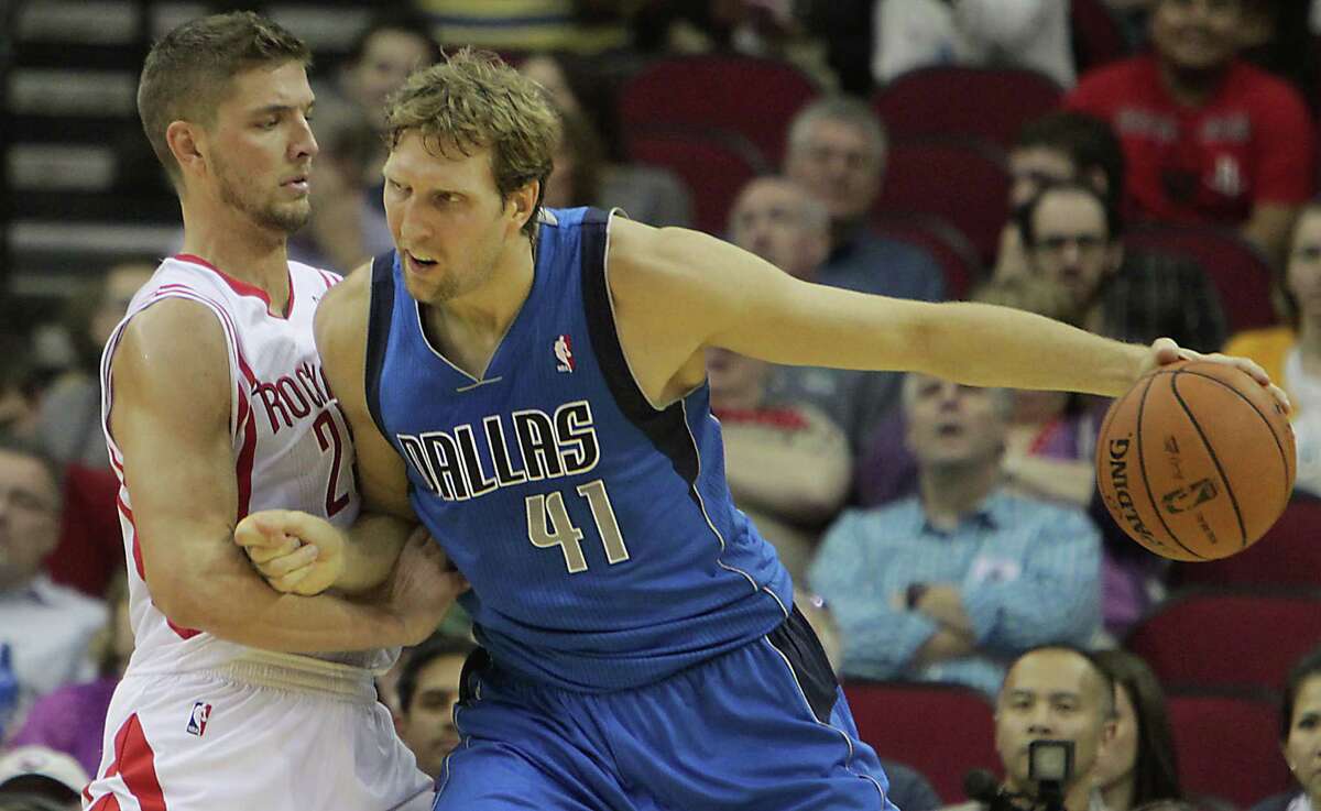 Unless the Rockets match the offer sheet Chandler Parsons, left, received from Dallas on Wednesday, Parsons will be playing alongside Dirk Nowitzski (41) next season instead of against the Mavericks veteran.