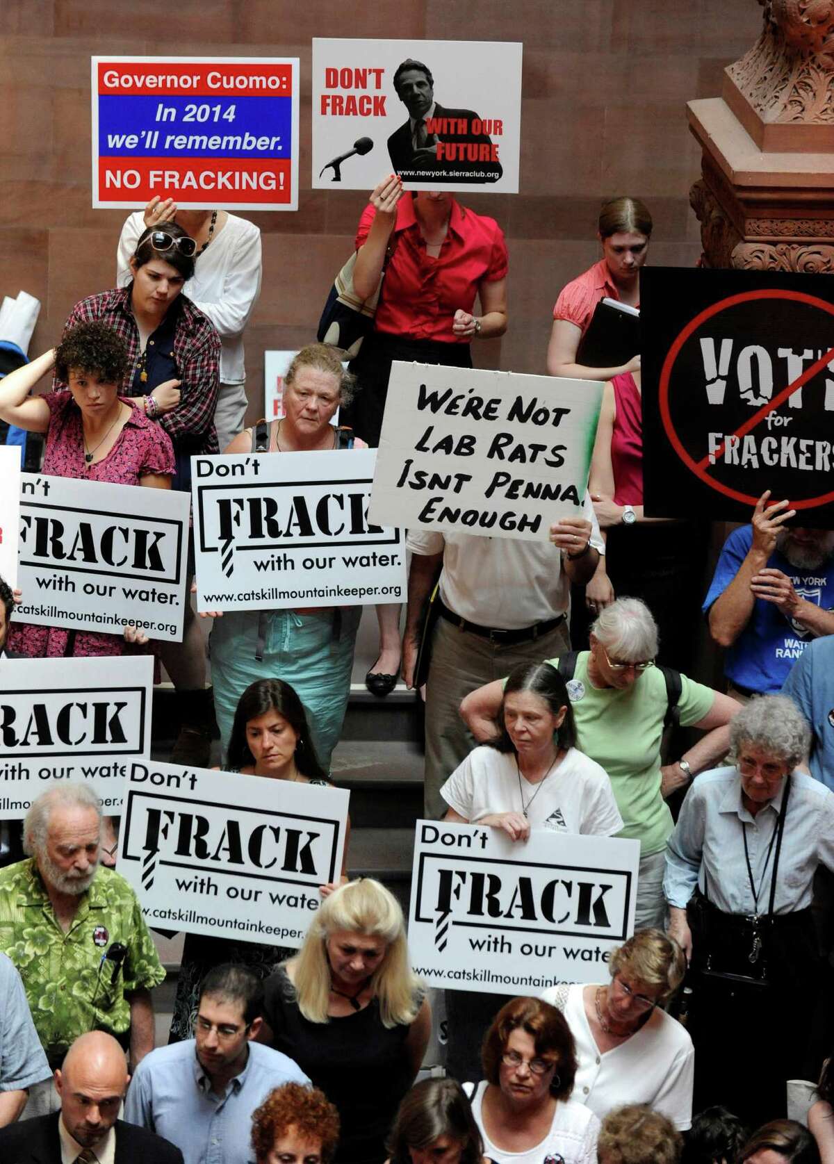 As an oil and gas boom drives drillers into areas outside the historical oil patch, an industry group has issued guidelines for improving community relations amid protests like these in Albany, N.Y. (AP Photo/Tim Roske, File)