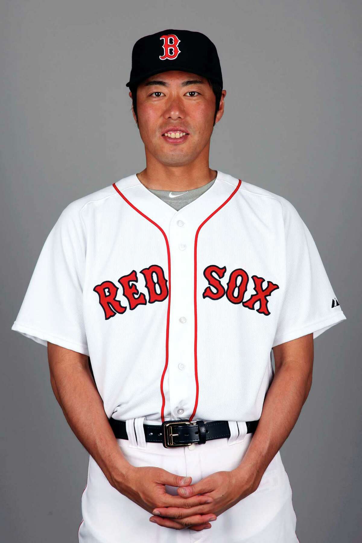 Koji Uehara Boston Red Sox 2014 MLB photo FORT MYERS, FL - FEBRUARY 23: Koji Uehara #19 of the Boston Red Sox poses during Photo Day on Sunday, February 23, 2013 at JetBlue Park in Fort Myers, Florida. (Photo by Eliot J. Schechter/MLB Photos via Getty Images) *** Local Caption *** Koji Uehara