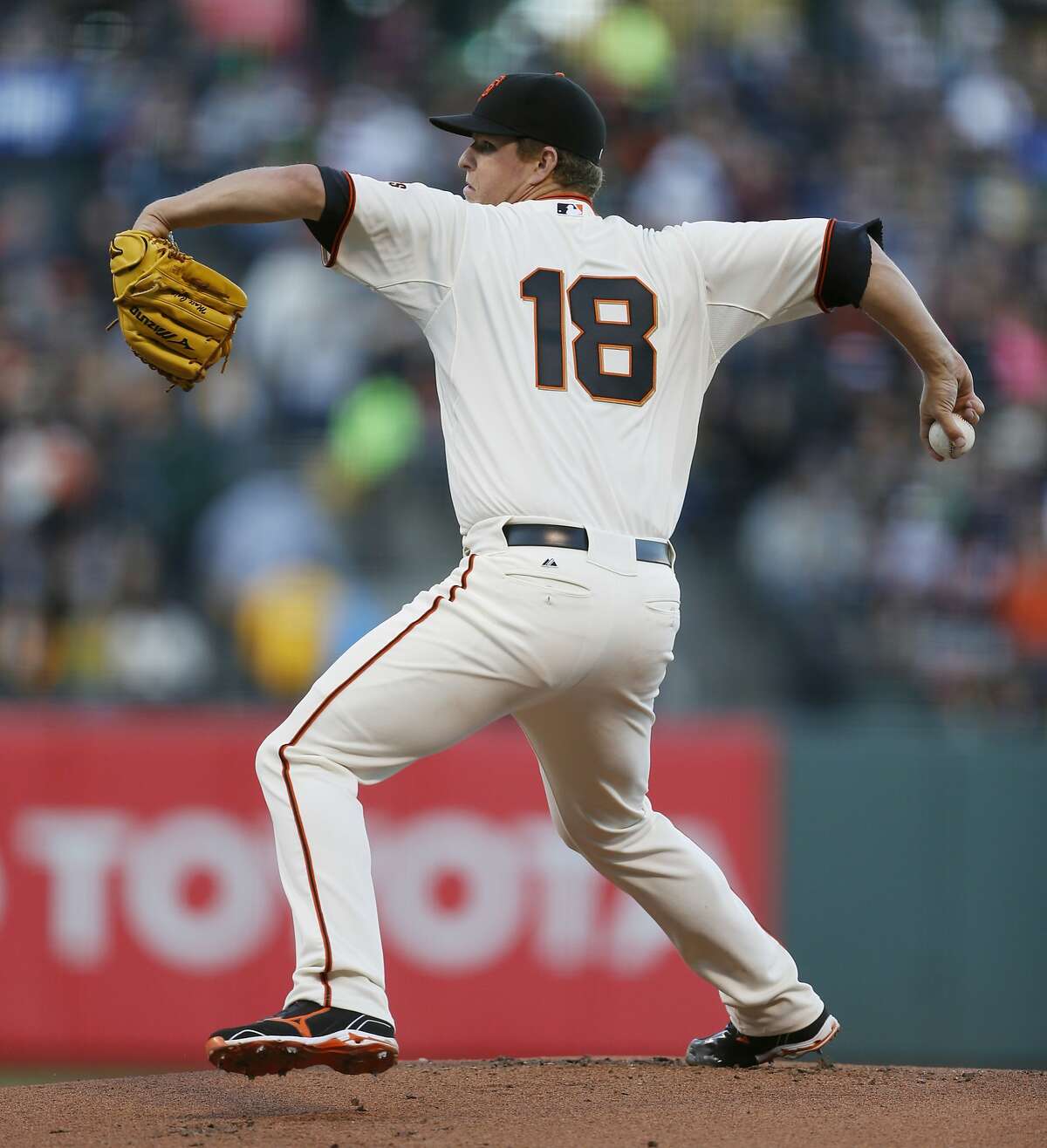 Giants' Cain limits A's to finally get 2nd win of season