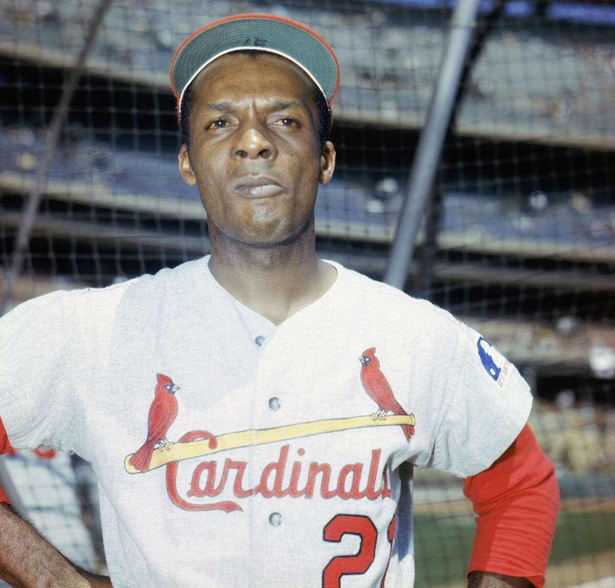 1970: Flood opens the gates While longtime St. Louis Cardinals outfielder Curt Flood didn't actually sign a free-agent contract during his 15-year career, his refusal to accept a trade to the moribund Philadelphia Phillies following the 1969 season led to a challenge of Major League Baseball's reserve clause, eventually opening the door for free agency in 1975.