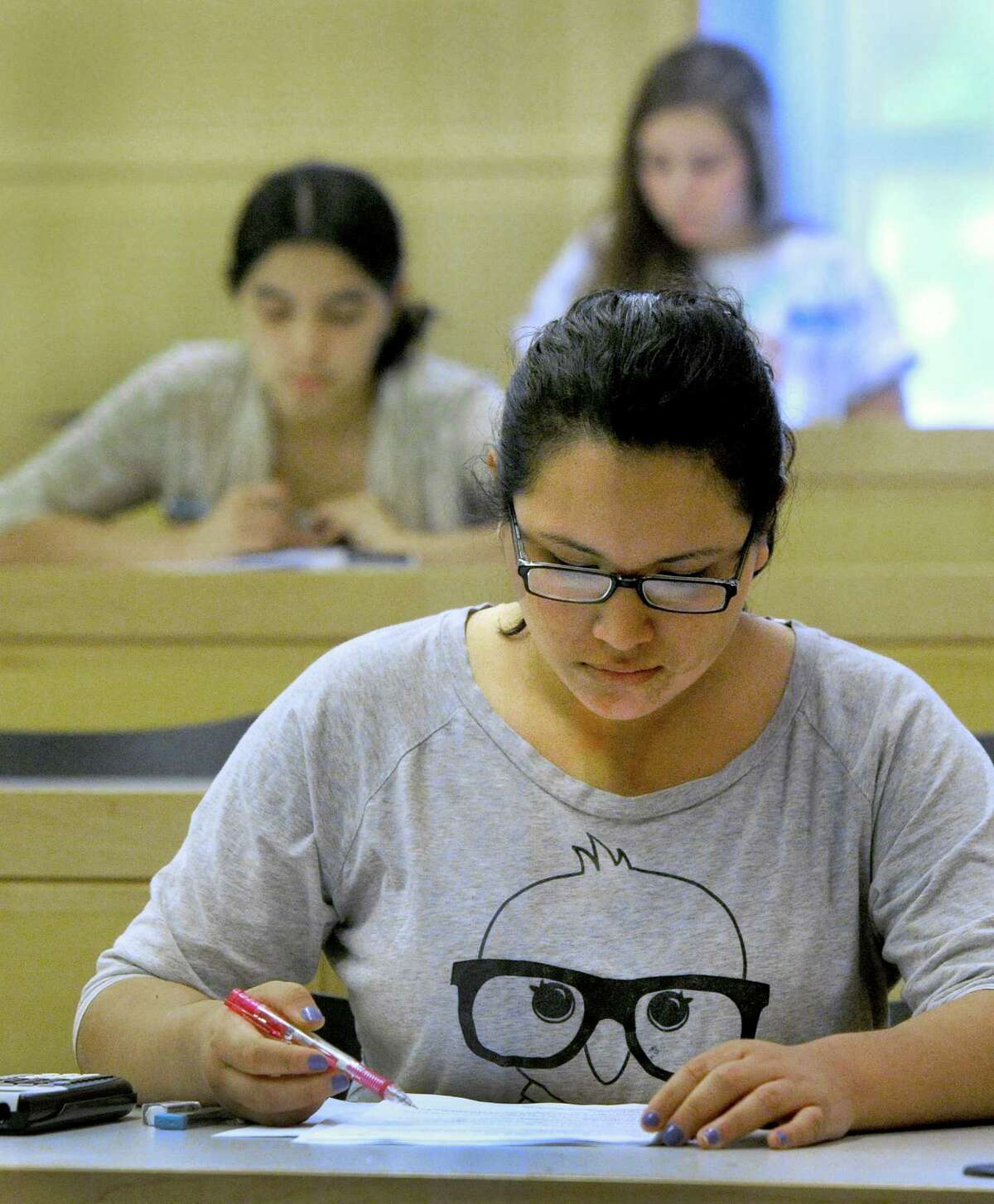 Marcia Salazar Levano, 18, takes an exam in a level 2 general chemistry class at Western Connecticut State University Thursday, July 10, 2014.