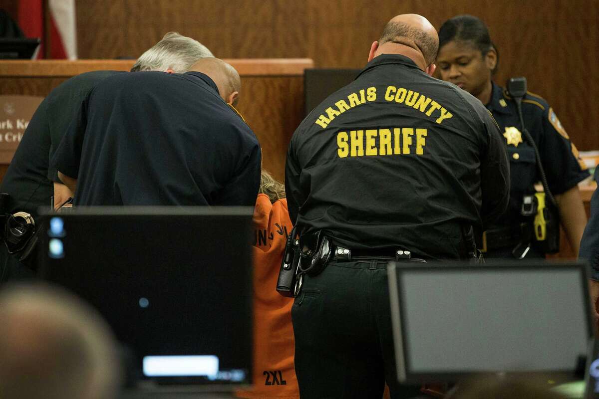 Suspect in Spring killings collapses in court