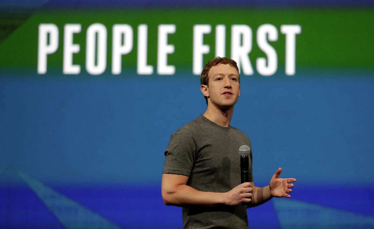 In this April 30, 2014 file photo, Facebook CEO Mark Zuckerberg gestures while delivering the keynote address at the f8 Facebook Developer Conference in San Francisco. Zuckerberg and his wife, Priscilla Chan, are donating $120 million over the next five years to the San Francisco Bay Area’s public school system. The gift is the biggest allocation to date of the more than $1 billion in Facebook stock the couple pledged last year to the nonprofit Silicon Valley Community Foundation.