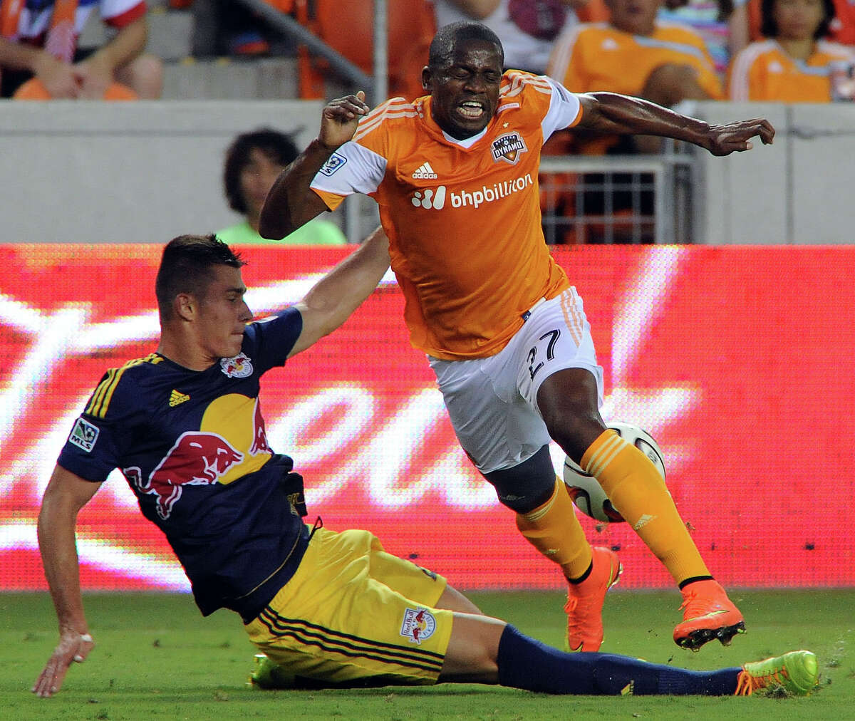 The return of Boniek Garcia, right, from World Cup play boosted the Dynamo's roster, but the team has a long way to go to be in playoff contention.﻿