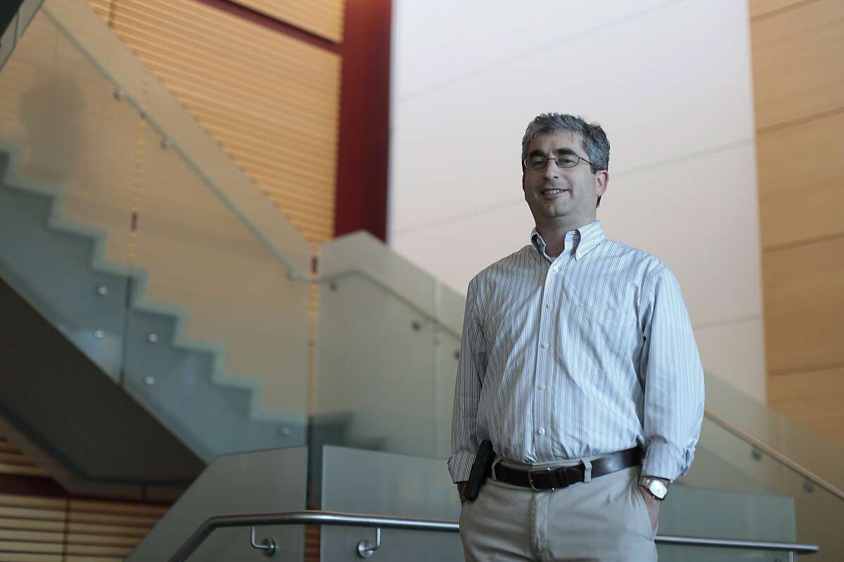 Dr. Brian Feldman poses for a portrait at Stanford University in Palo Alto, Calif. on Wednesday, July 9, 2014. This microchip helps to distinguish between the two main forms of diabetes.