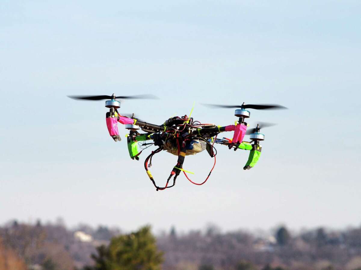 FAA rules allow hobbyists to fly drones, like this small one in Middletown, Md. Amazon says it has been testing drone delivery indoors and in other countries.