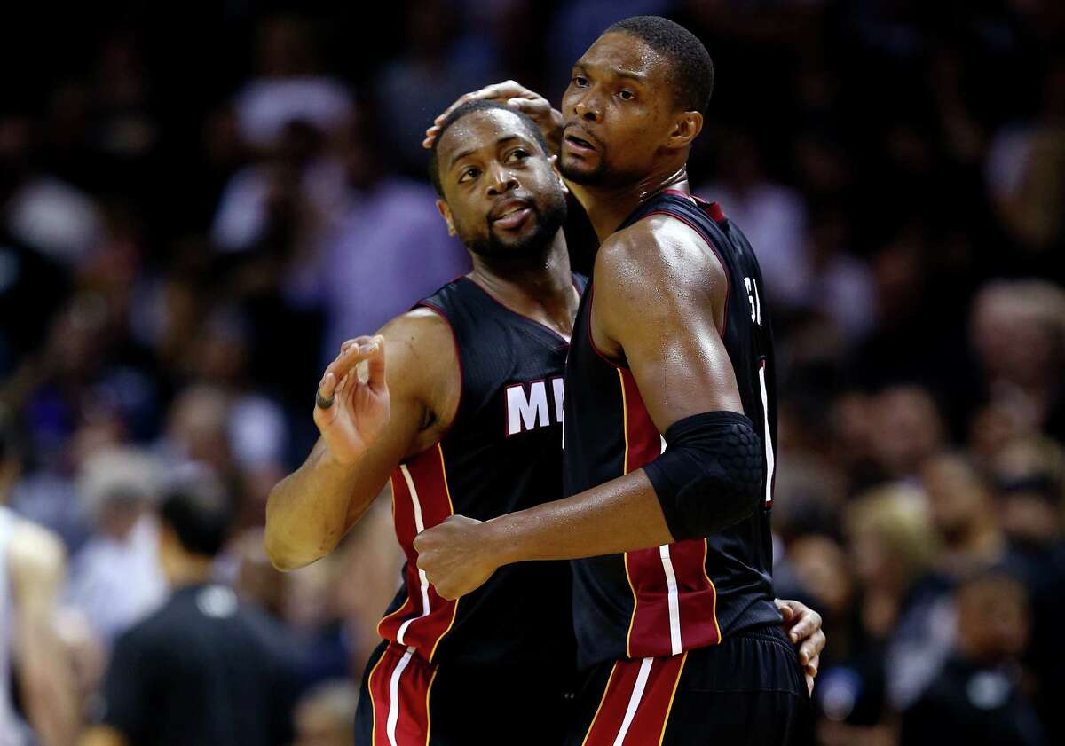 Forward Chris Bosh, right, and guard Dwyane Wade might be all that's left of the "Big 3" in Miami after LeBron James chose to return to the Cleveland Cavaliers.