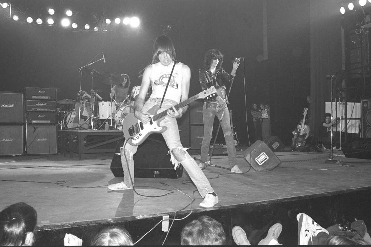 NEW YORK - JANUARY 07: The Ramones perform live on stage at The Palladium, New York on January 07 1978 L-R Tommy Ramone (drums) Johnny Ramone (guitar) Joey Ramone (vocals) (Photo by Richard E. Aaron/Redferns)