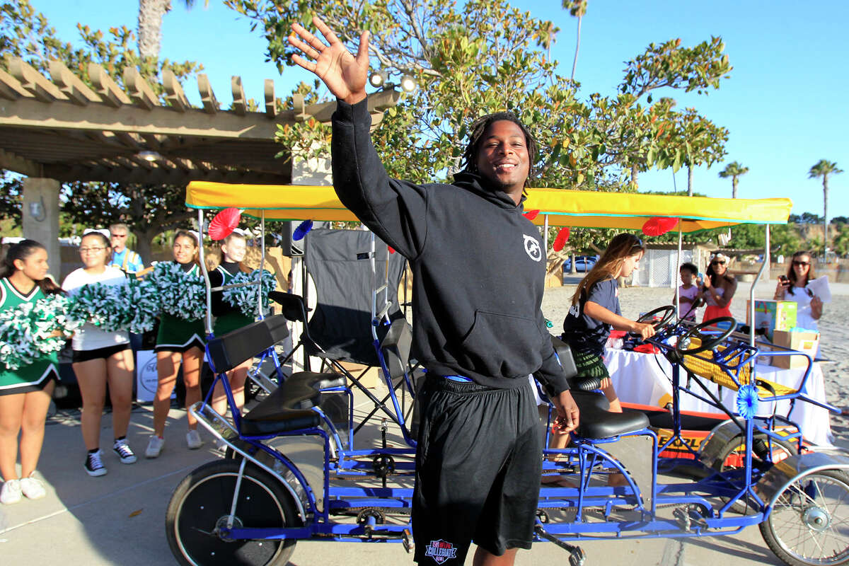 Above: Lonnie Ballentine embraced his "Mr. Irrelevant" designation last week in Newport Beach, Calif., where he greeted the crowd at the Mr.?…Irrelevant Week Arrival Party.