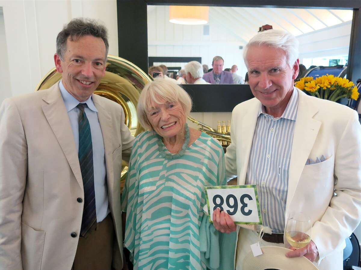 Festival del Sole director Rick Walker (left) with board members Margrit Mondavi and Timothy Blackburn at the Meadowood Gala. July 2014. By Catherine Bigelow.