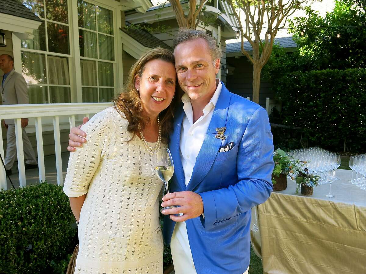 Vintners Gina Gallo and her husband, Jean-Charles Boisset at the Meadowood Gala. July 2014. By Catherine Bigelow. Vintners Gina Gallo and her husband, Jean-Charles Boisset at the Meadowood Gala. July 2014. By Catherine Bigelow.