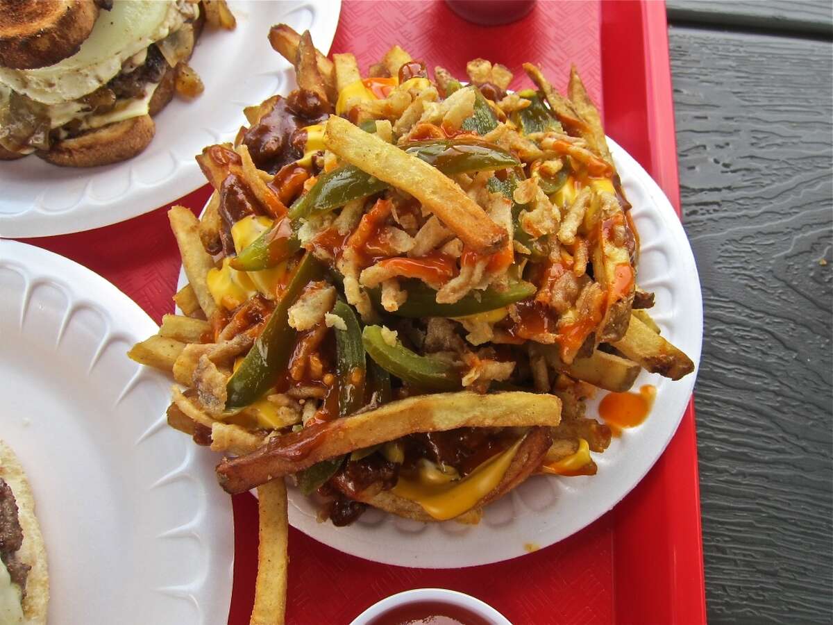 Texas fries with chili, cheese, pickled jalapeños, onions and Krystal hot sauce at Hubcap Grill.