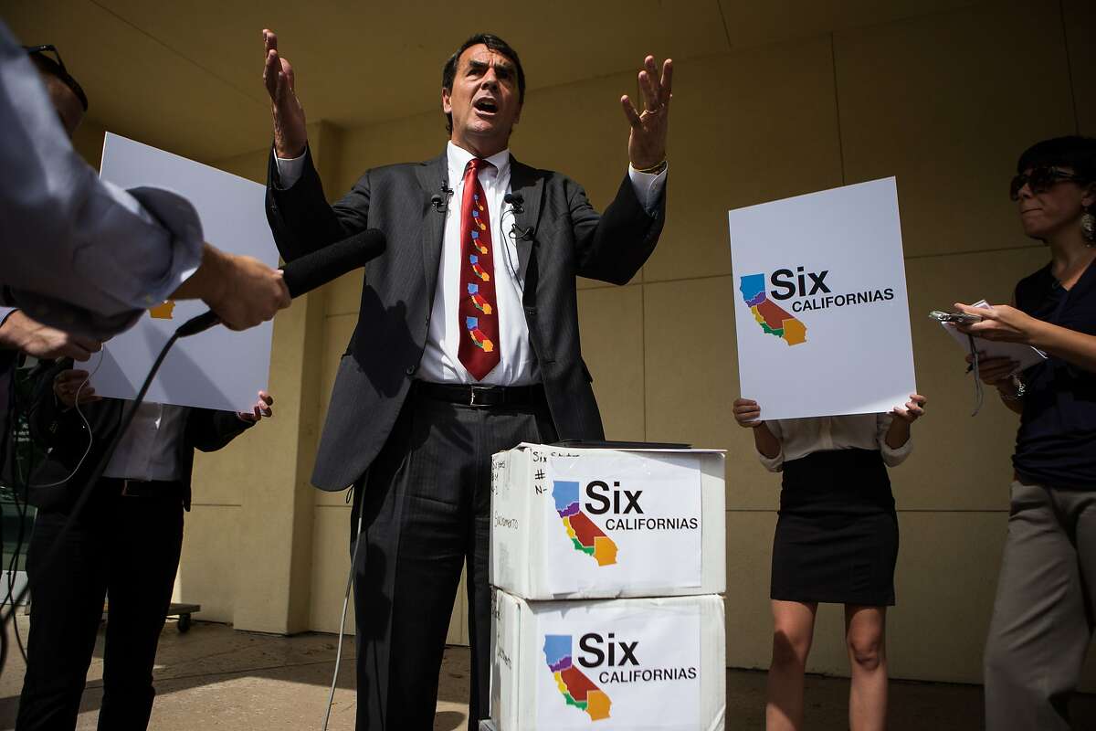 Venture capitalist Tim Draper speaks to reporters about his proposal to divide California into six separate states during a press conference to deliver signed petitions at the County of Sacramento Voter Registration and Elections Department in Sacramento, California, July 15, 2014.