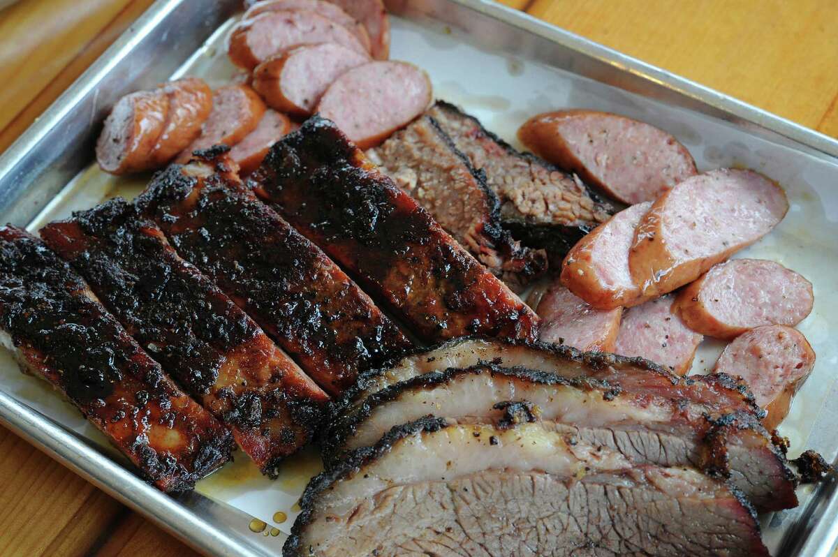 The Smoke Shack meats include lean and marbled brisket, sausage and St. Louis style pork ribs. June 13, 2014.