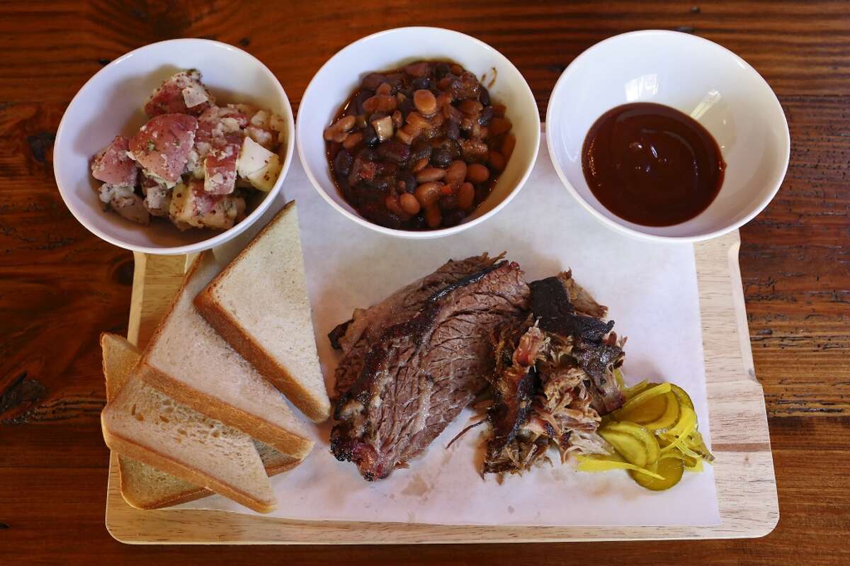 Barbecue Board: market style fare served with baked beans, potato salad, buttermilk bread, pickles and 'cue sauce, at The Granary in the Pearl Brewery complex in San Antonio on Wednesday, Jan. 30, 2013.