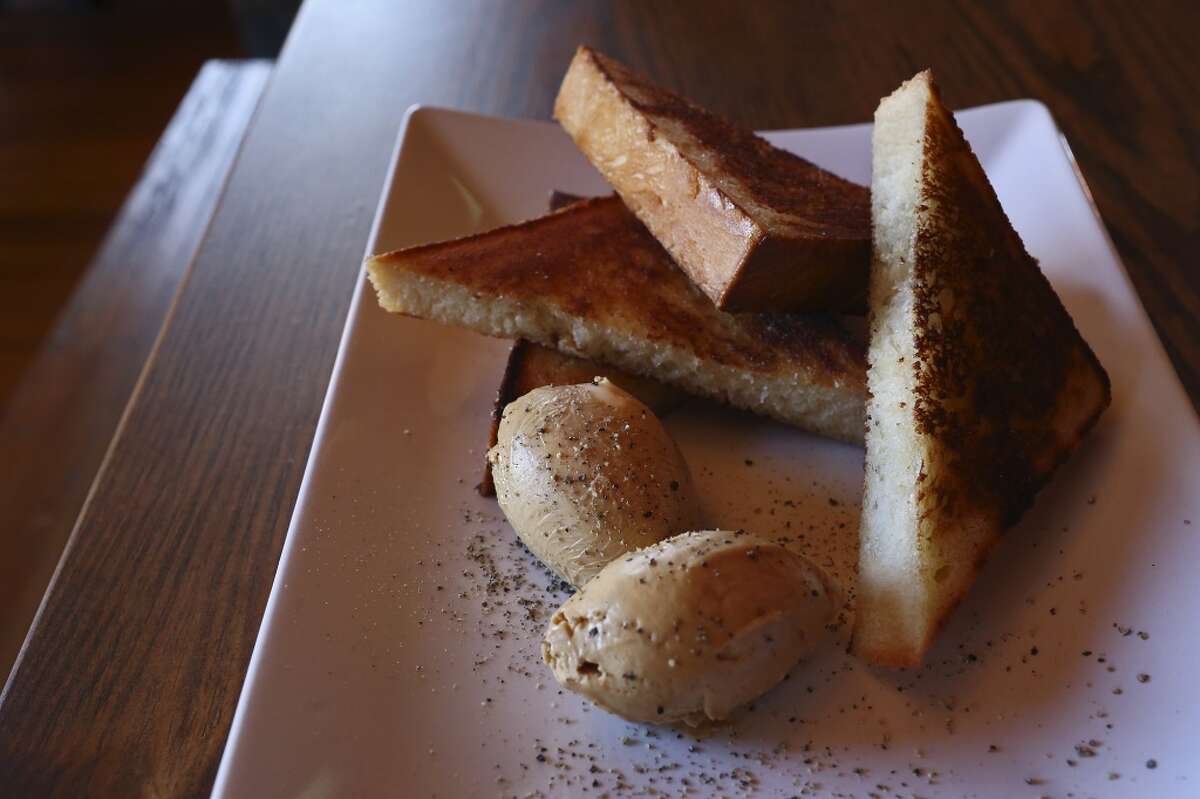 Texas Toast: buttermilk bread, barbecue butter and cracked black pepper, at The Granary 'Cue & Brew at The Pearl is mentioned in the November 2014 issue of Food & Wine magazine.