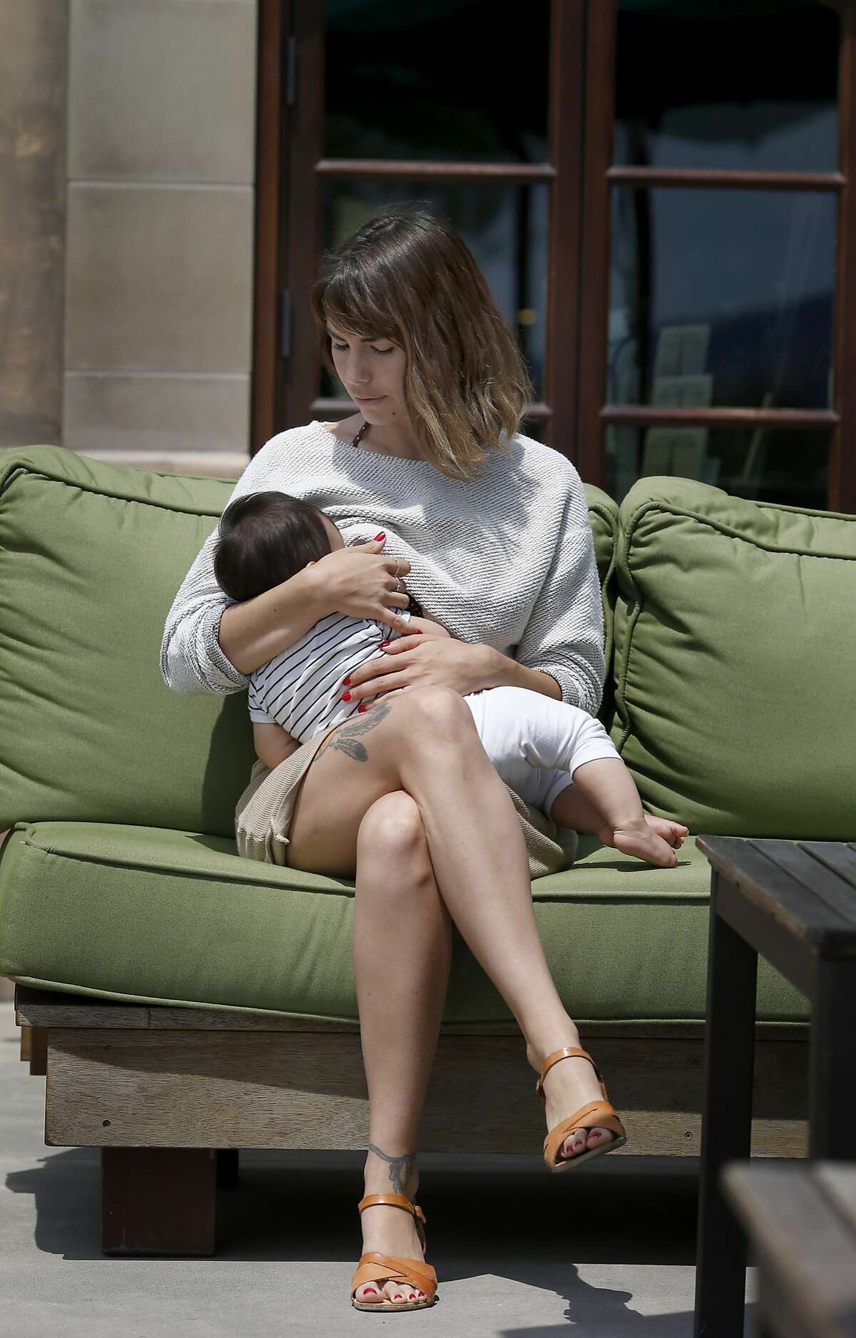 Mandee Jaigirdar breastfeeds her daughter Lila during a visit to the wine country Wednesday July 16, 2014. Mandee Jaigirdar and other "instagram Moms" are planning a protest at Instagram/FB headquarters stemming from photos of breastfeeding being removed from the picture website.