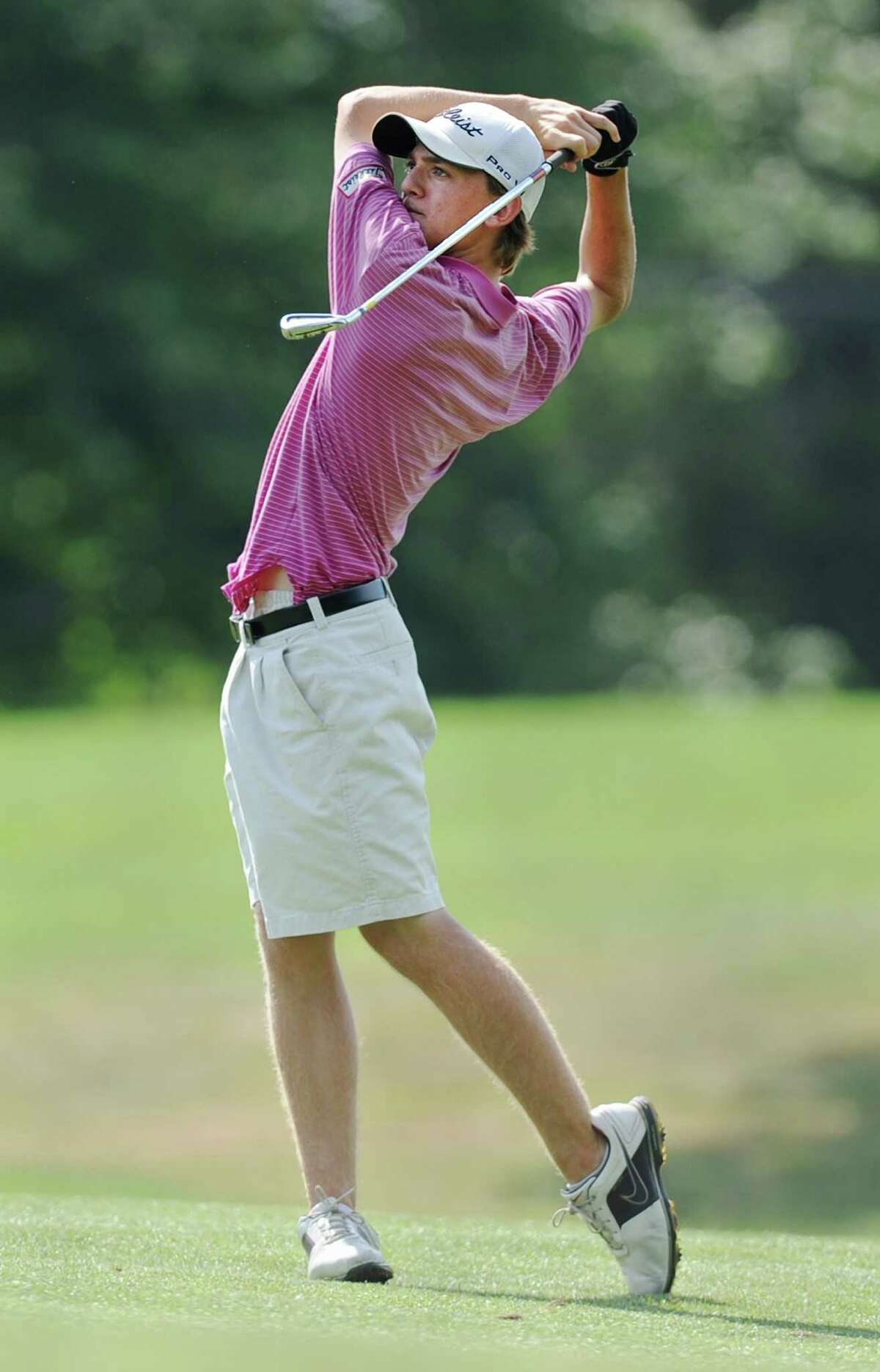 Patrick Hallisey tees off during day two of the Danbury Amateur Golf Championship at Richter Park Golf Club in Danbury, Conn. on Saturday, July 21, 2013.