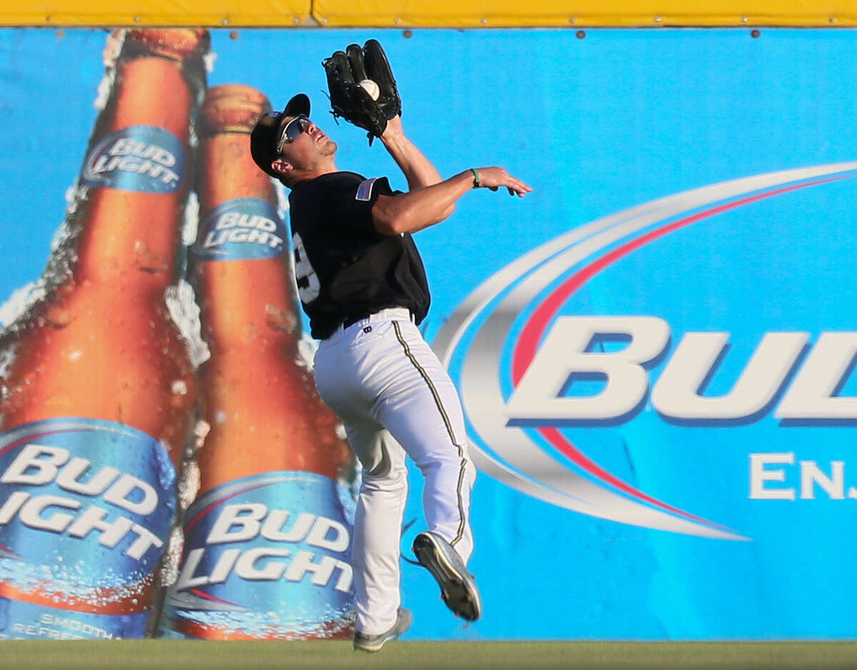 The Missions' Hunter Renfroe makes an over-the-shoulder catch in right-center field during the second inning at Wolff Stadium. The center fielder had a single in the victory over Frisco.