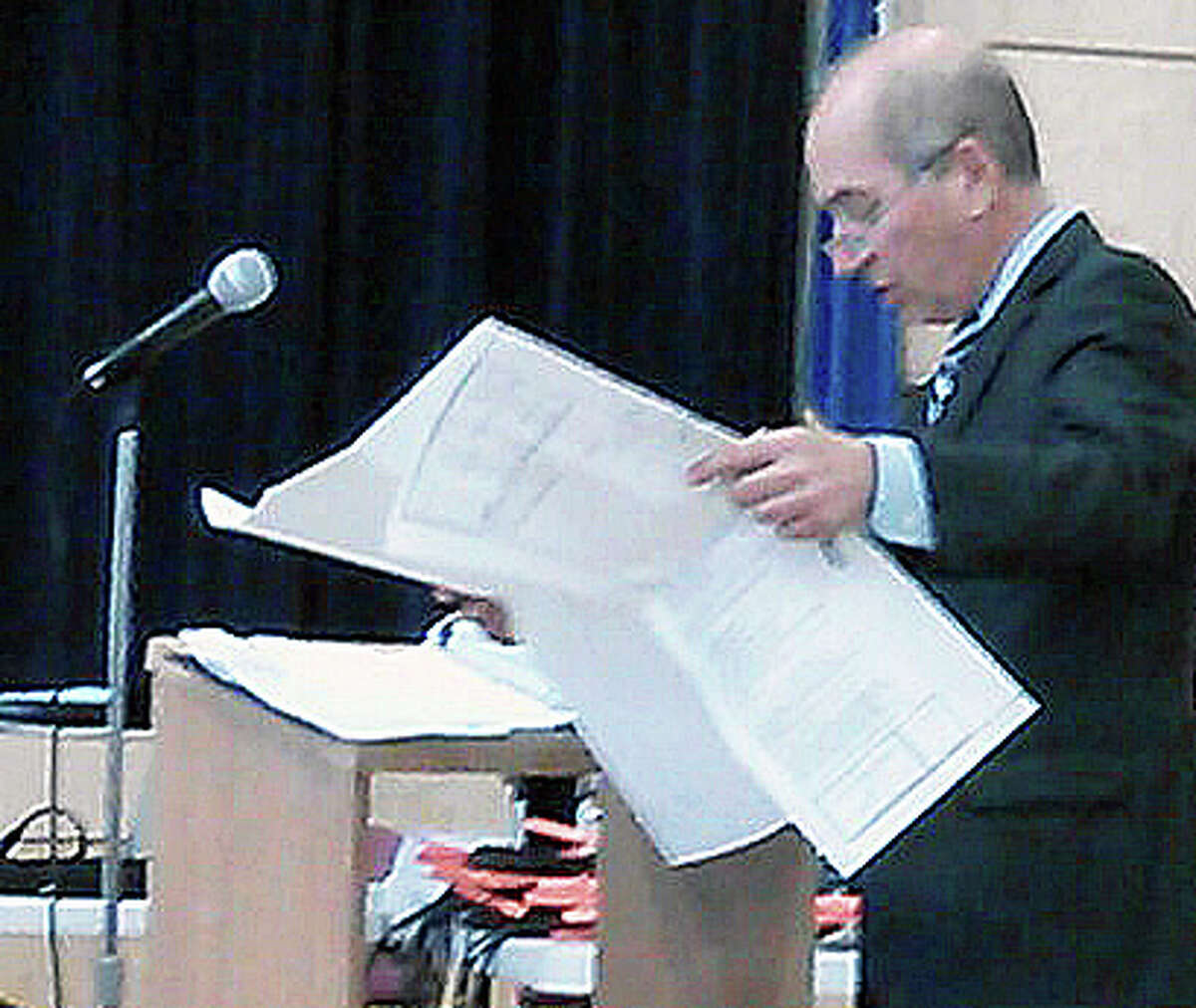 Joel Z. Green, the lawyer for opponents of a proposed 95-unit apartment building on lower Bronson Road, wraps up his presentation to the Town Plan and Zoning Commission Wednesday night in McKinley School.