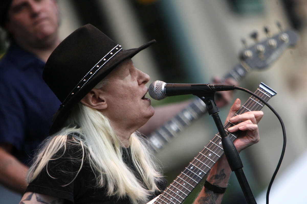 FILE - In this Friday, June 19, 2009 file photo, Johnny Winter plays during the Canton Blues Festival 2009 in downtown Canton, Ohio. Texas blues icon Johnny Winter, who rose to fame in the late 1960s and '70s with his energetic performances and recordings that included producing his childhood hero Muddy Waters, died in Zurich, Switzerland on Wednesday, July 16, 2014. He was 70. MANDATORY CREDIT