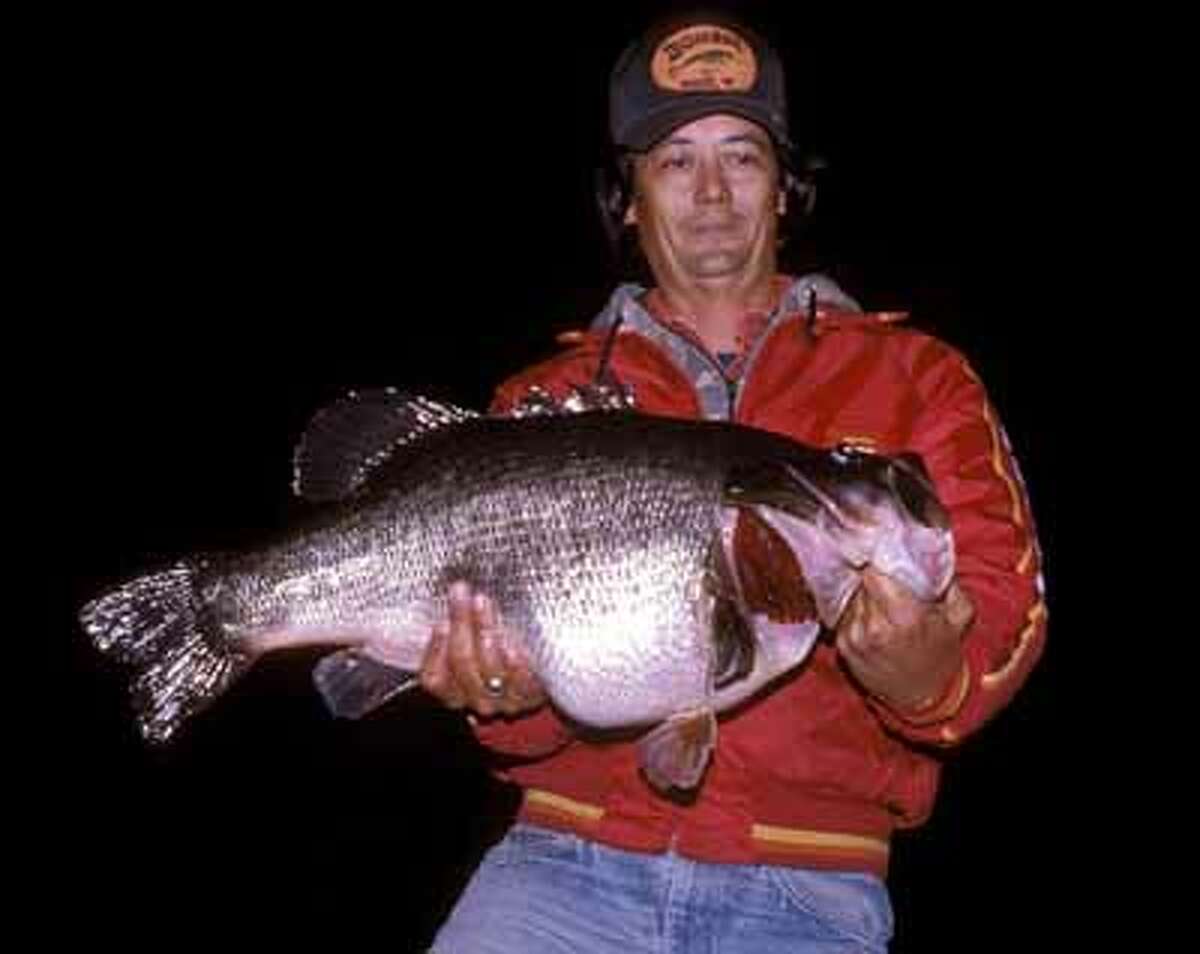 Mark Stevenson and the first lunker caught as part of the ShareLunker program. Caught in 1987 and weighed 17.67 lbs.