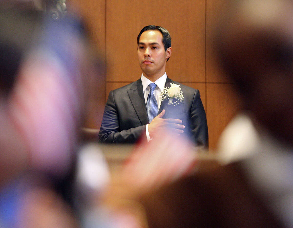 Mayor Julian Castro stands as the national anthem is played during his 2011 swearing-in ceremony. With Castro leaving to become Secretary of HUD, a reader says the mayor selected should intend to run for the position in the next election.