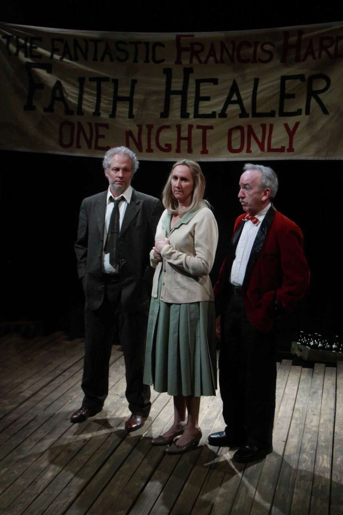 (For the Chronicle/Gary Fountain, January 19, 2014) "Faith Healer" was a highlight of Stark Naked Theatre's last season; shown (from left) are stars Philip Lehl, Kim Tobin-Lehl and John Tyson. The company will be promoting its 2014-15 season as part of Spring Street Studio's open house this week.