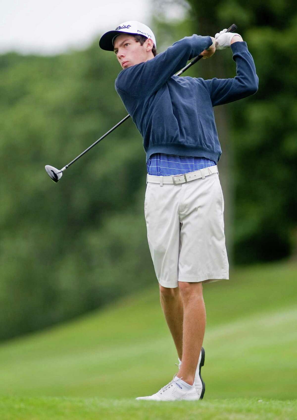 Max Theodorakis drives the ball at the Danbury Amateur golf tournament at Richter Park. Saturday, July 19, 2014
