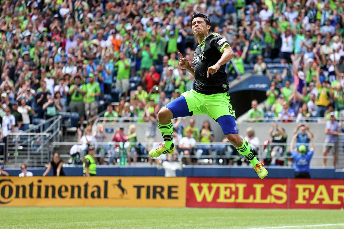 Midfielder Gonzalo Pineda celebrates after scoring on a penalty kick during the Seattle Sounders FC friendly against Tottenham Hotspur of the English Premier League on Saturday, July 19, 2014. The match ended in a 3-3 draw.