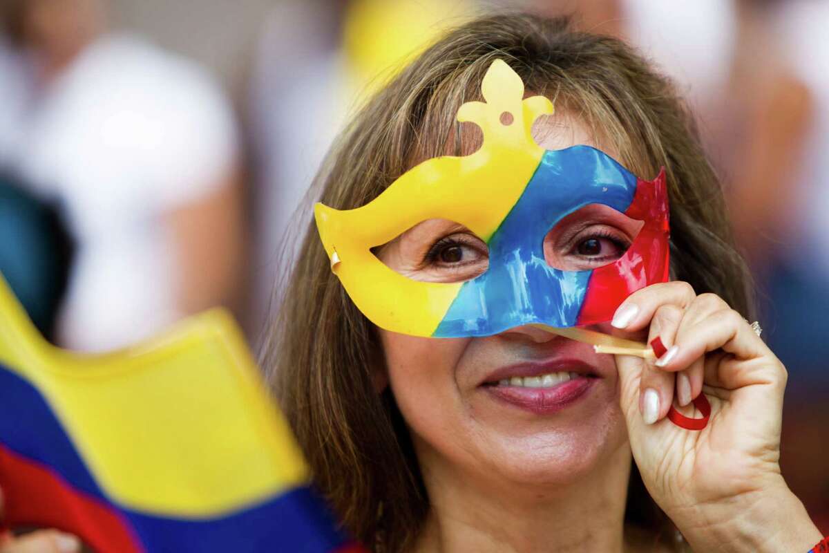 Colombia Aya-Rosillo originally of Colombia, celebrates Colombia's Independence Day, dancing and wearing the country's colors at the Colombian Fest 2014in Houston, Sunday, July 20, 2014.